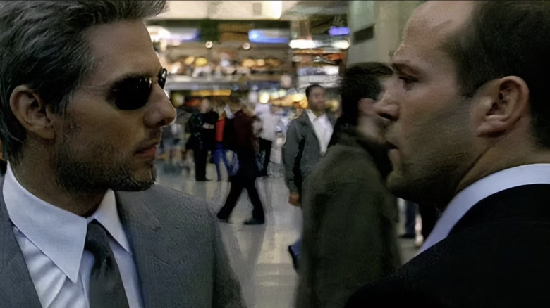Vincent and Frank stare at each other in "Collateral" (2004)