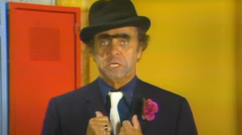 Les Lye in a fedora