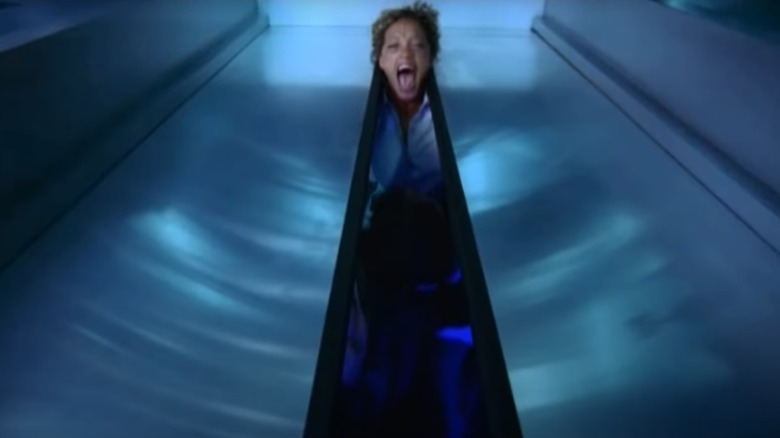 Woman screaming in an elevator