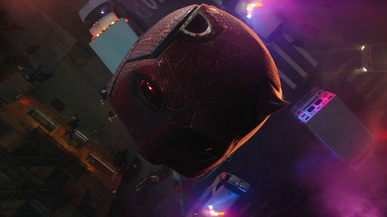 Daredevil's mask falling to the ground