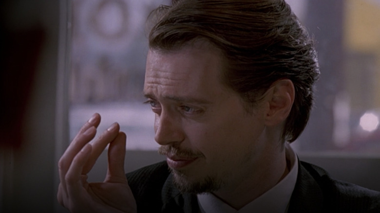 Mr. Pink plays the world's smallest violin