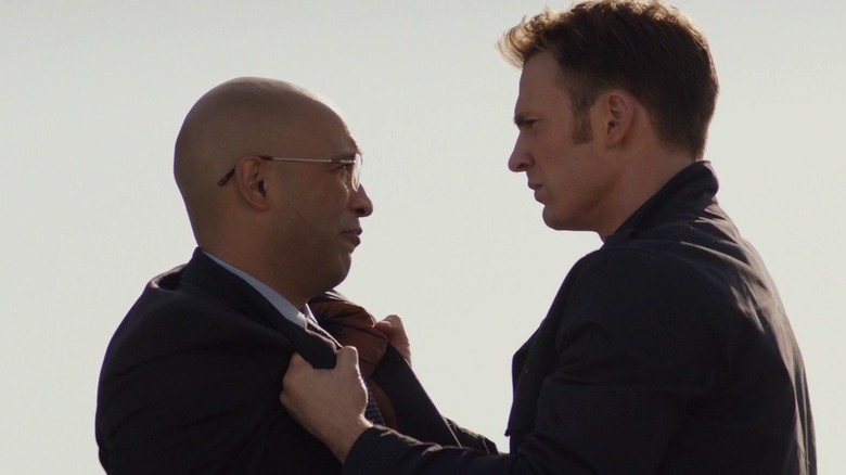 Steve Rogers holds HYRDA agent