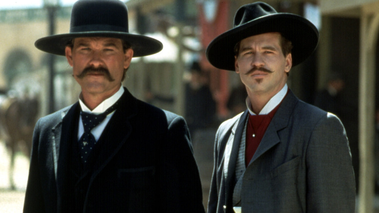 Doc Holliday and Wyatt Earp stare in 