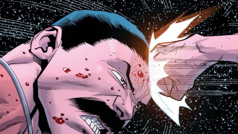 Thragg enduring one of Invincible's punches